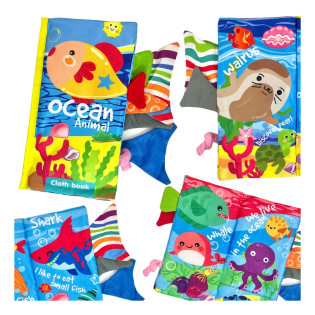 WOOPIE BABY šušteća knjiga od tkanine s repovima morskih životinja i šarenim ilustracijama oceanskog svijeta.